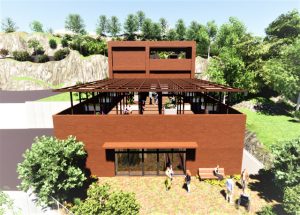 赤茶色のレンガ造りの介護施設の建物外観。周囲は緑に囲まれた庭園環境